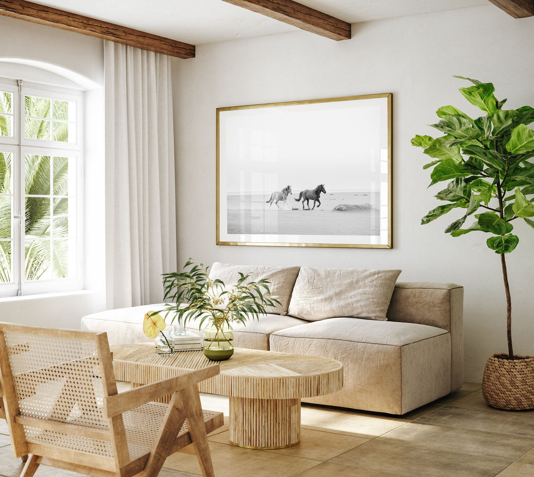 black and white photo of horses in modern interior