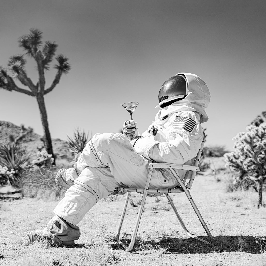 astronaut drinking a martini