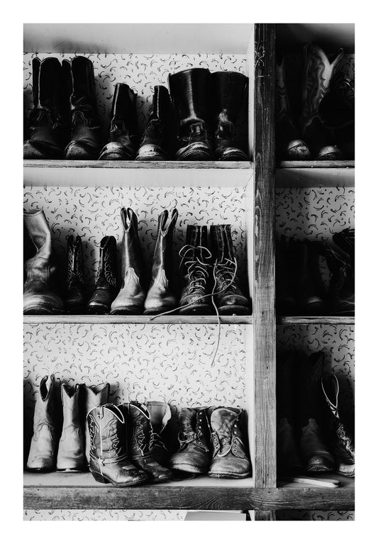 Old cowboy boots black and white photography