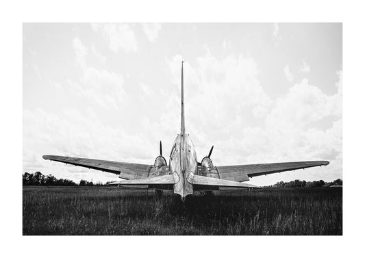 black and white aviation photograph of a c-47 plane