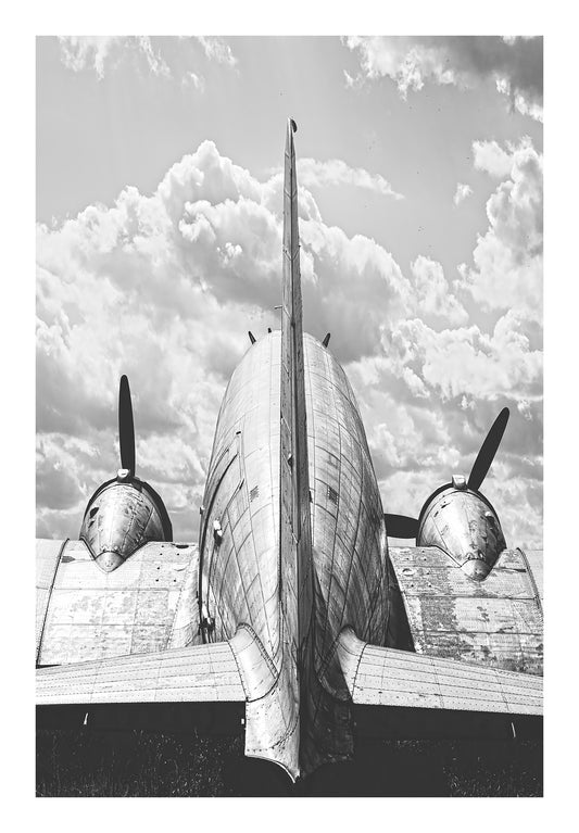 black and white of a old silver dc-3 plane. 